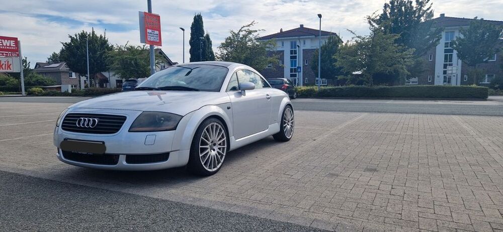 TT