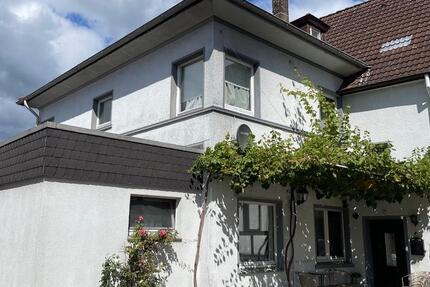 Wohn- und Geschäftshaus mit Balkon, Gartenblick zimmer