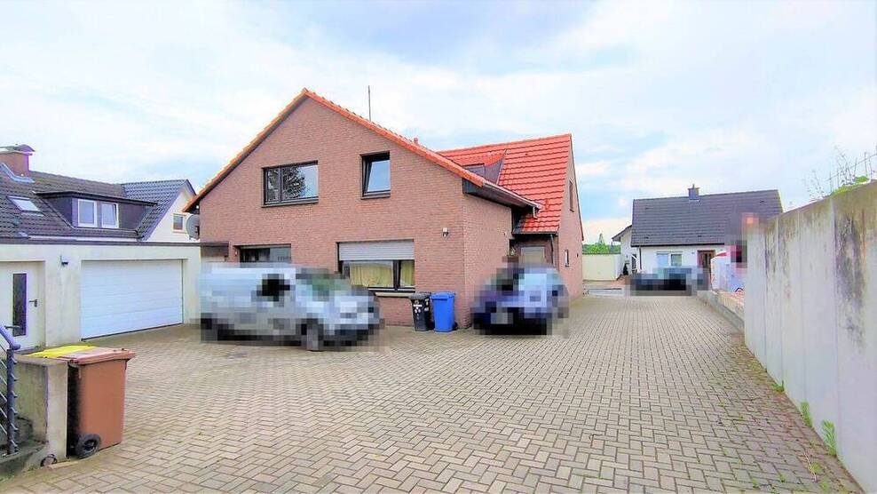 Geräumiges EFH mit ELW, Terrasse, Balkon, kleinem Garten und Garage in ruhiger Lage